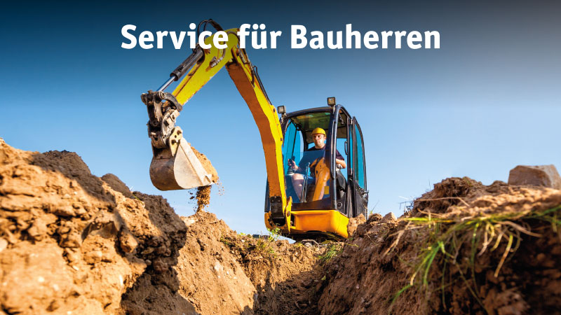 Ein Bagger gräbt einen Graben